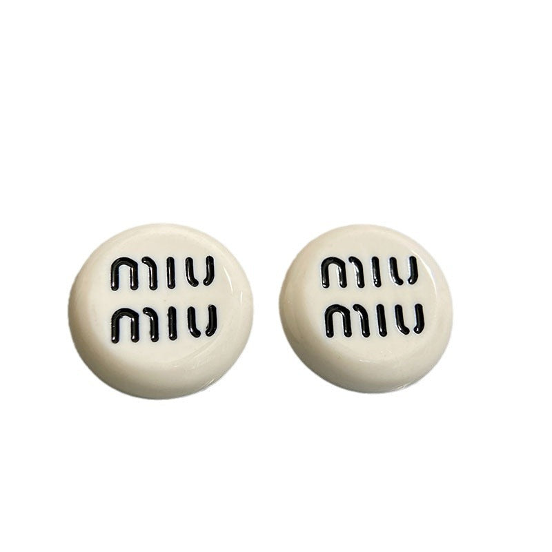 Black and white letter round earrings