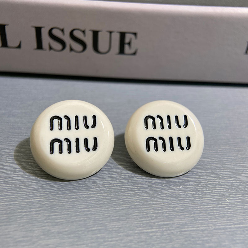 Black and white letter round earrings